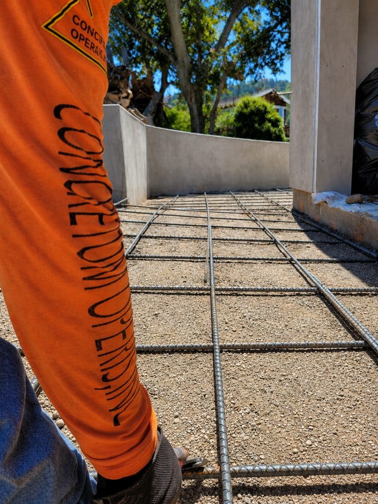 Concretum Operis branded sleeve on a job site in Richmond, CA