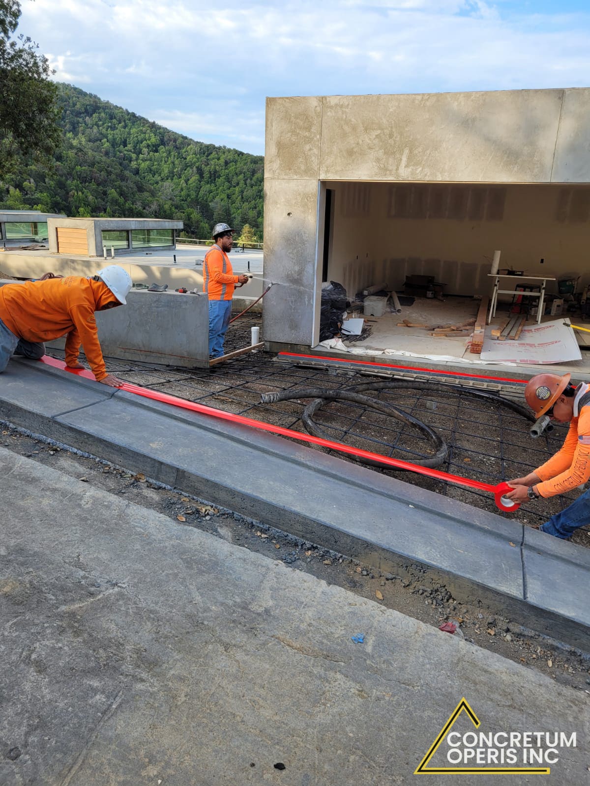 Completed concrete facade and driveway on a hillside property in San Rafael, CA