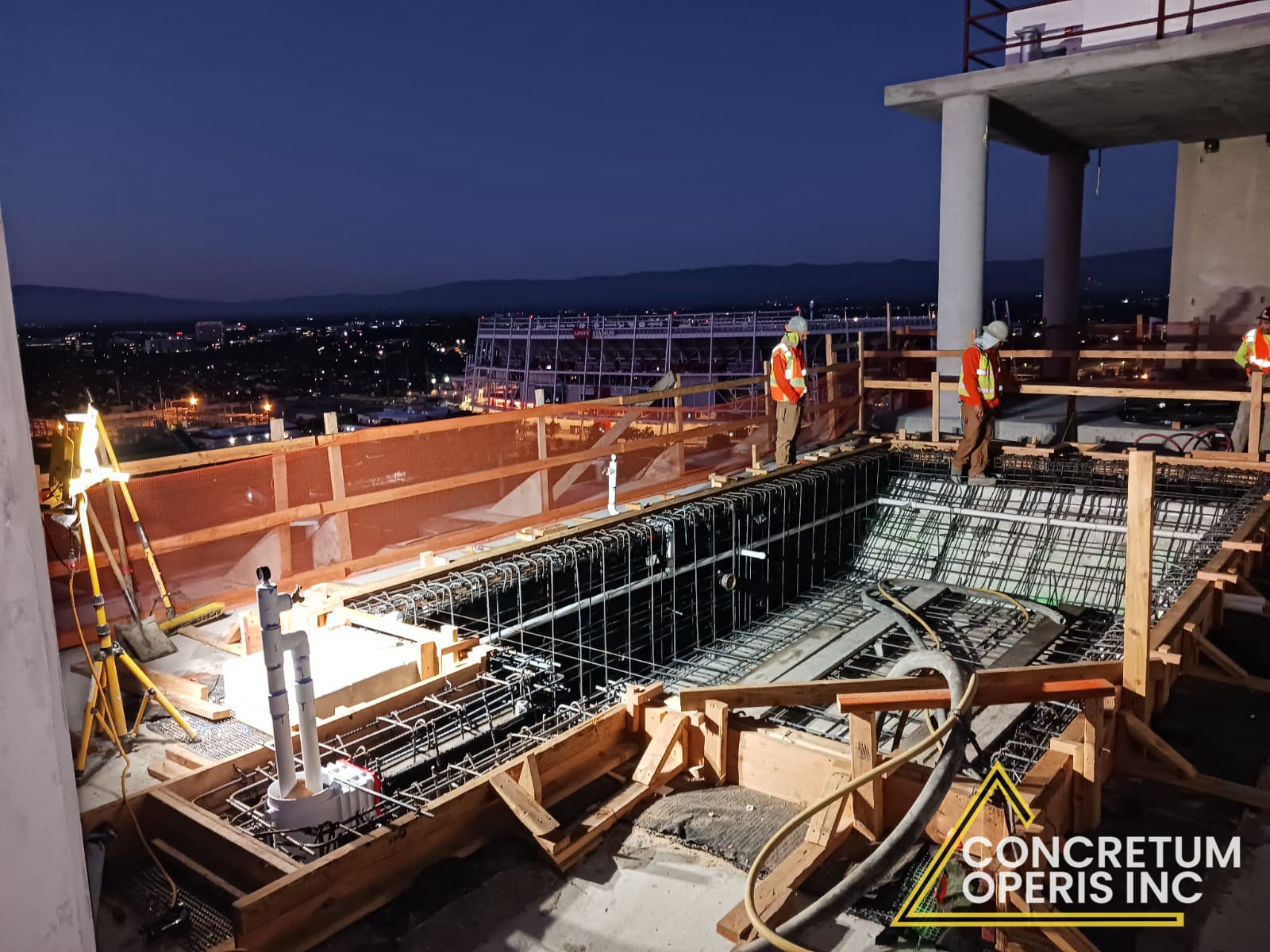 Completed concrete rooftop terrace with skyline view in Santa Clara, CA