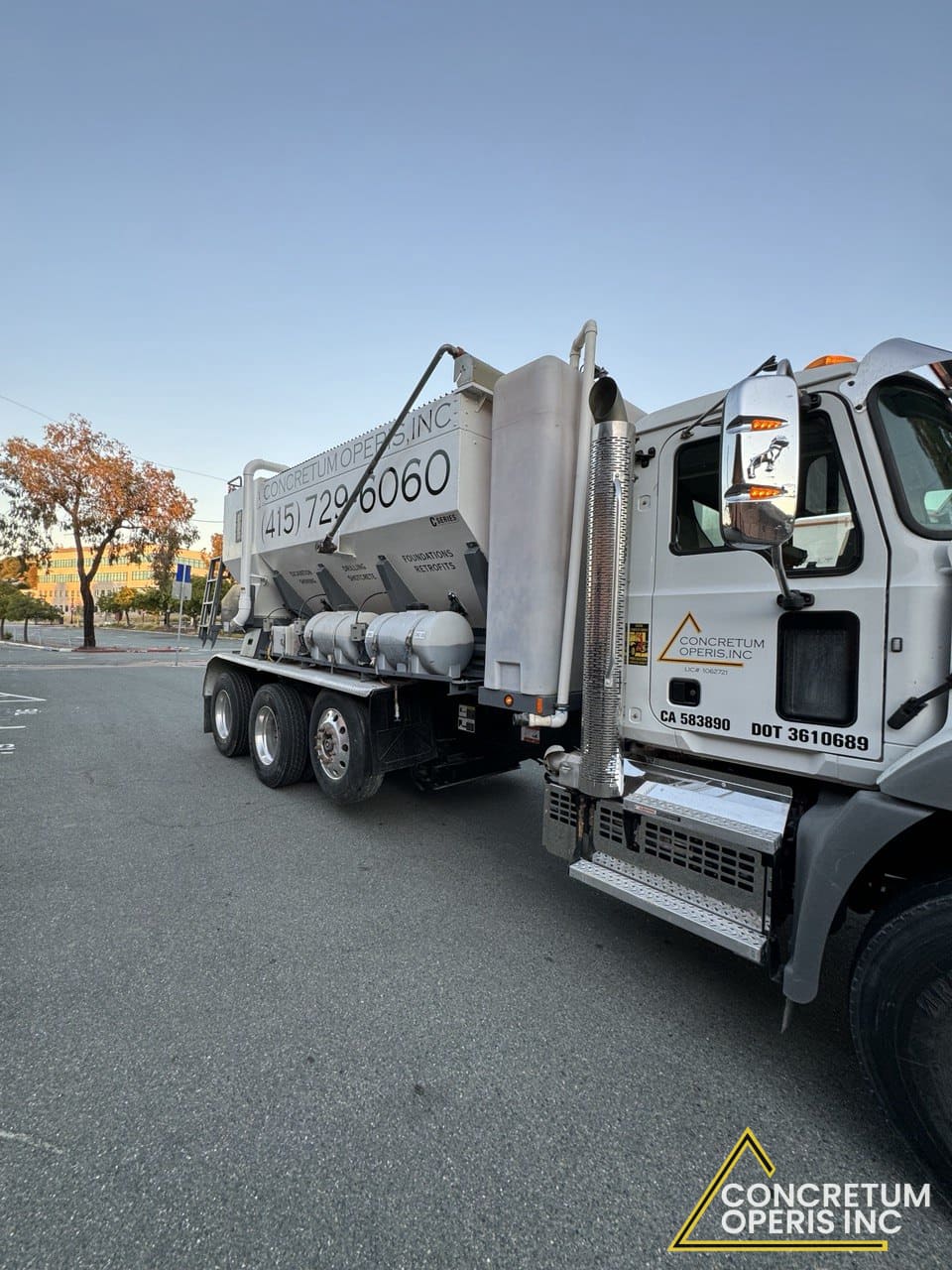 Concretum Operis ready-mix concrete supply truck in Richmond, CA