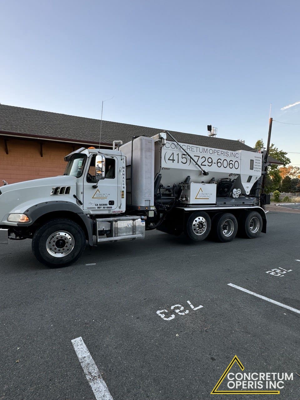 Concretum Operis ready-mix concrete supply truck in Richmond, CA