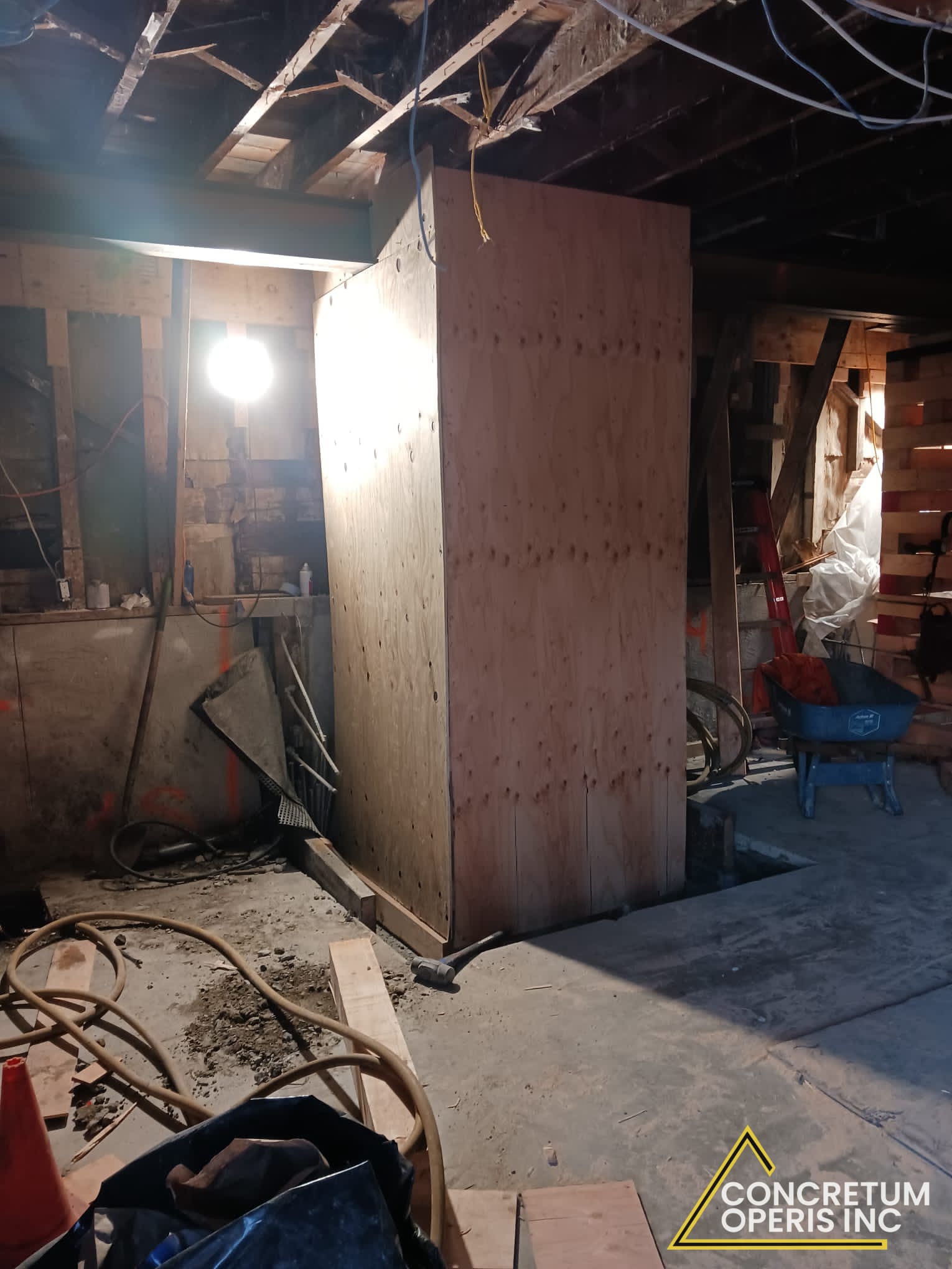 Wood cribbing and plywood shoring box supporting a foundation excavation in Richmond, CA