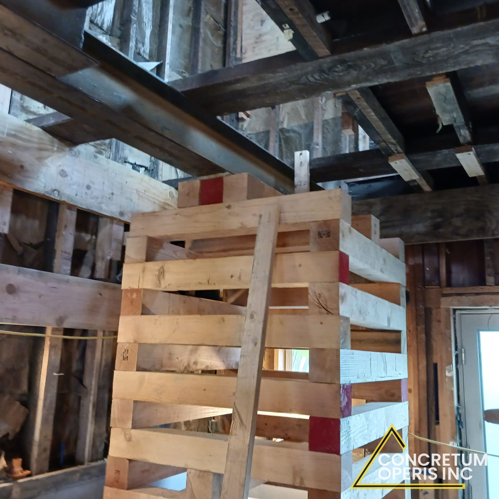 Timber cribbing tower shoring a foundation excavation in Richmond, CA