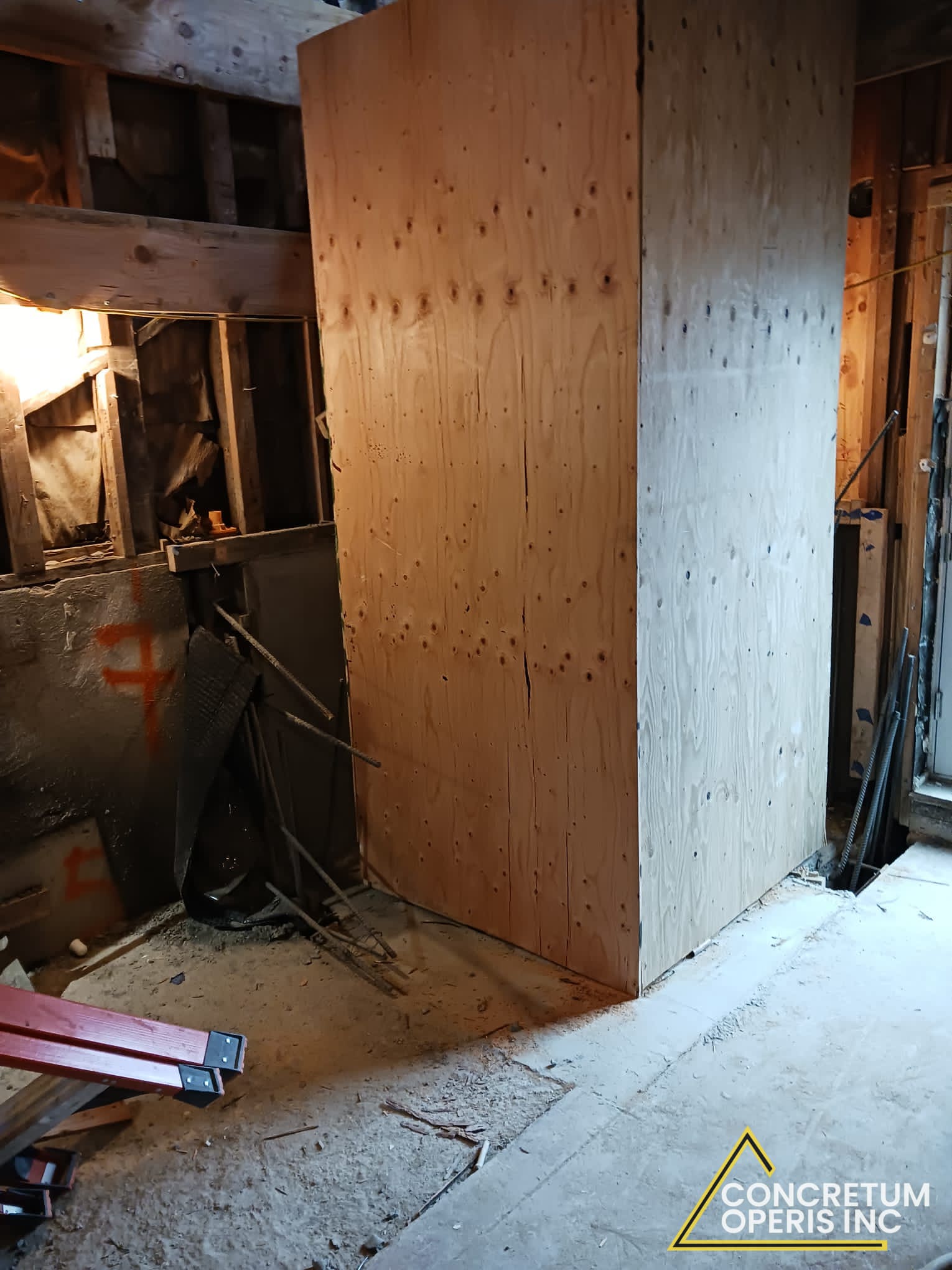 Plywood shoring panels installed along a foundation excavation in Richmond, CA