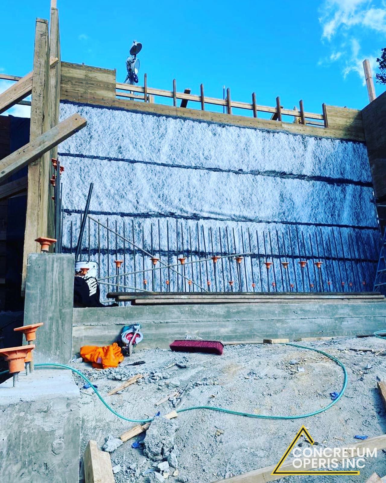 Concrete retaining wall poured against rebar-lined forms in Richmond, CA
